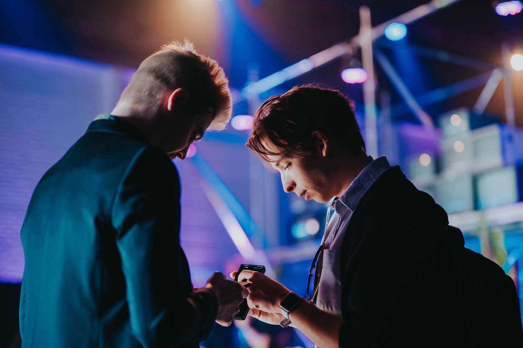 Filip and I solving a puzzle on his phone at Future Entrepreneurship 2022